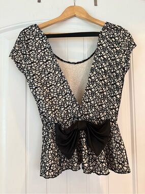 Adorable Black & Ivory Lace-Overlay Peplum Top with Bow - Charlotte Russe
